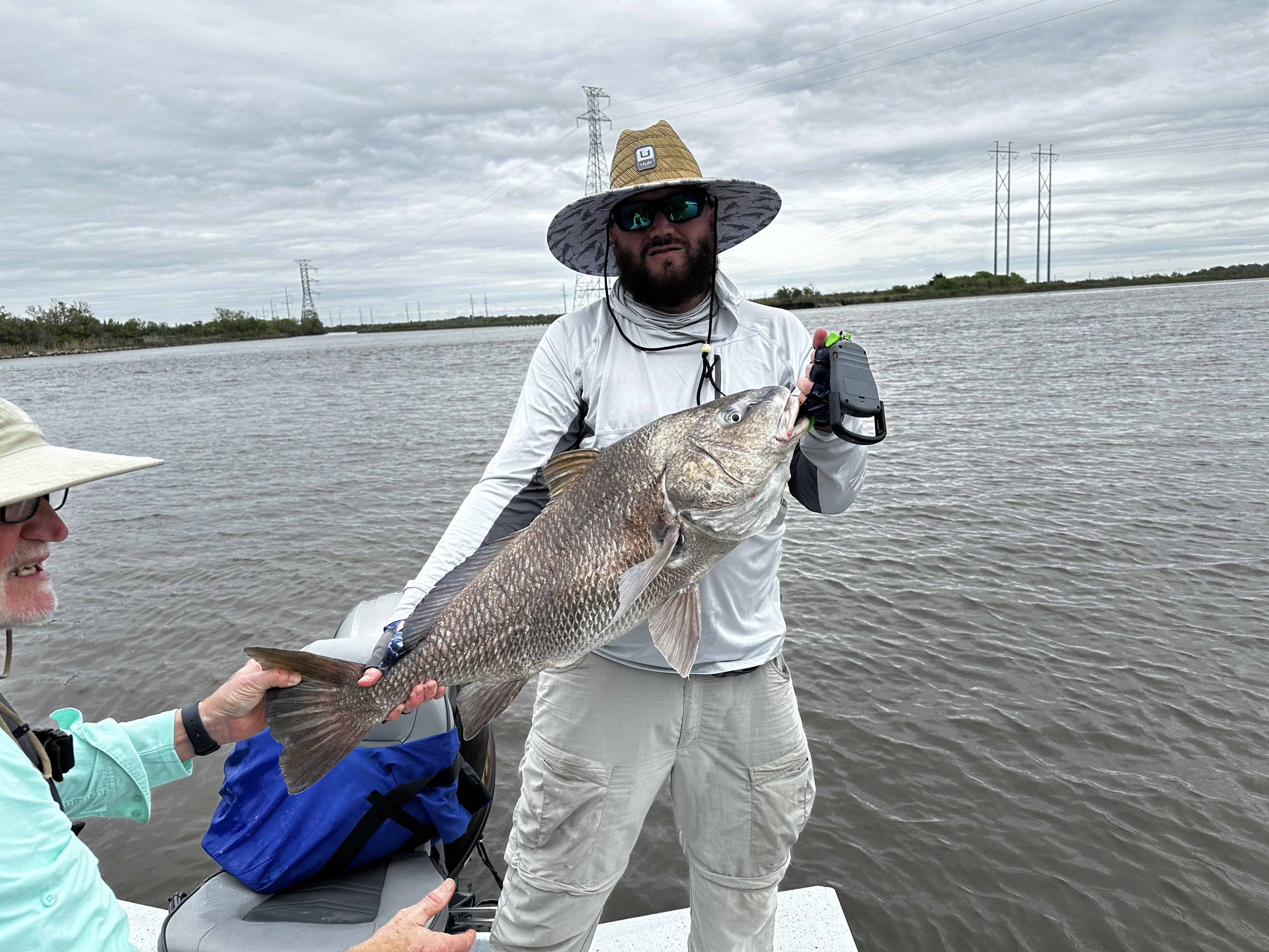 Bubba holding a large freshwater drum